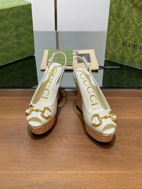 SANDALO CON ZEPPA GG IN PELLE DI VITELLO BIANCA