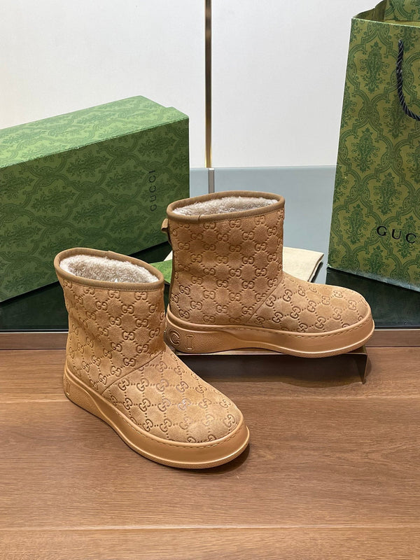 GG UGG BOOTS IN CIDER BROWN EMBOSSED SUEDE AND BEIGE WOOL LINING