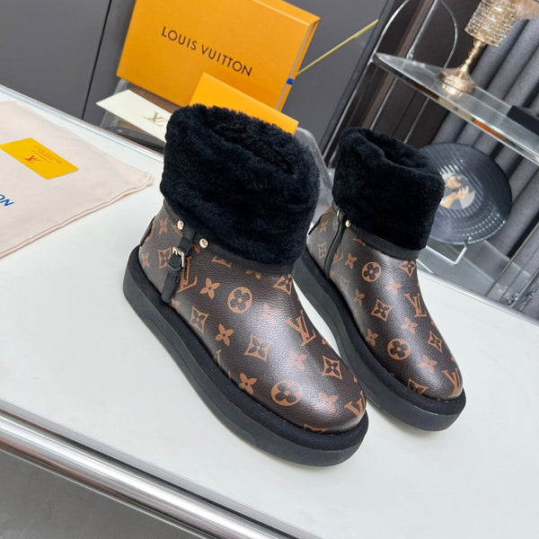 Stivaletto con plateau LV Aspen in pelle di vacchetta monogrammata marrone scuro