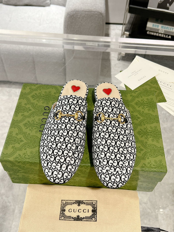 MULE DA UOMO CON MORSETTO IN TESSUTO JACQUARD CON MONOGRAMMA BIANCO E NERO