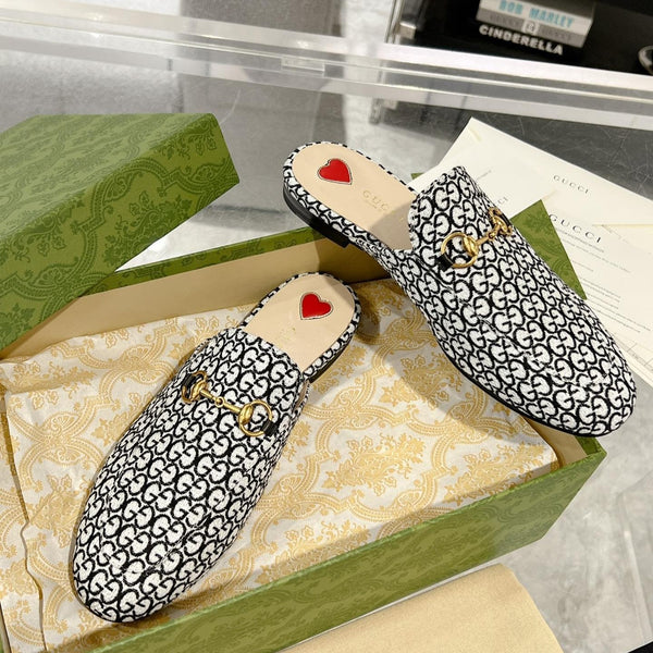 MULE DA UOMO CON MORSETTO IN TESSUTO JACQUARD CON MONOGRAMMA BIANCO E NERO