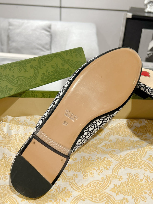 MULE DA UOMO CON MORSETTO IN TESSUTO JACQUARD CON MONOGRAMMA BIANCO E NERO