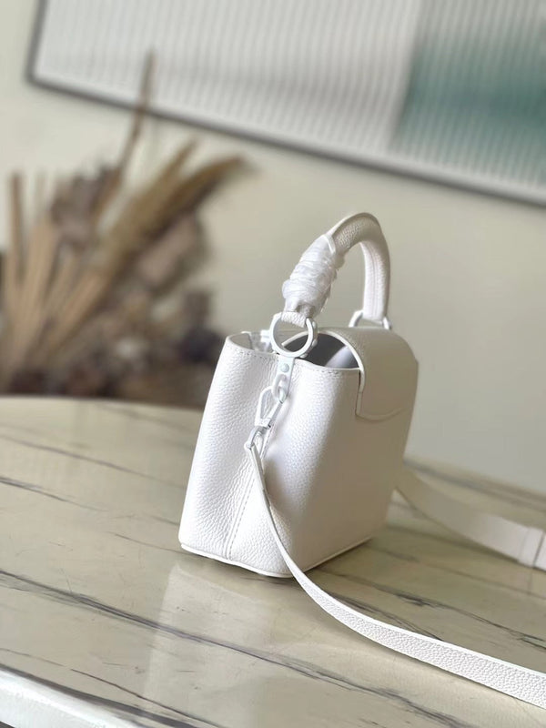 CAPUCINES EAST-WEST MINI 21 IN TAURILLON BIANCO