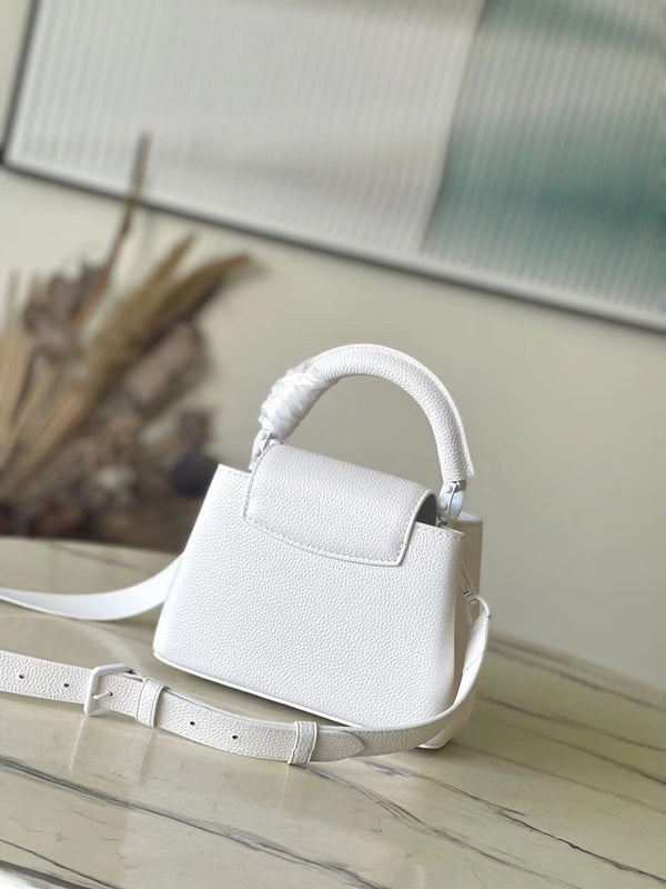 CAPUCINES EAST-WEST MINI 21 IN TAURILLON BIANCO