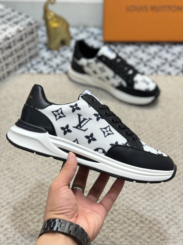 LV TRAINERS IN BLACK CALFSKIN AND WHITE JACQUARD