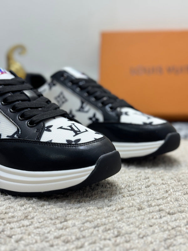 LV TRAINERS IN BLACK CALFSKIN AND WHITE JACQUARD