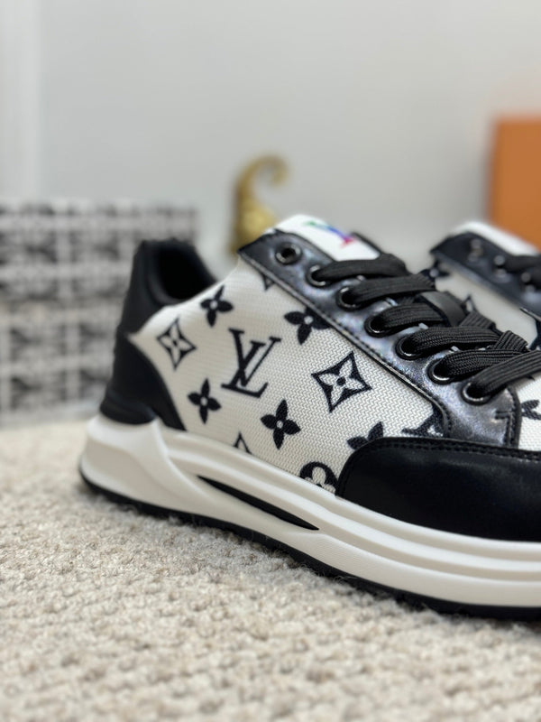 LV TRAINERS IN BLACK CALFSKIN AND WHITE JACQUARD