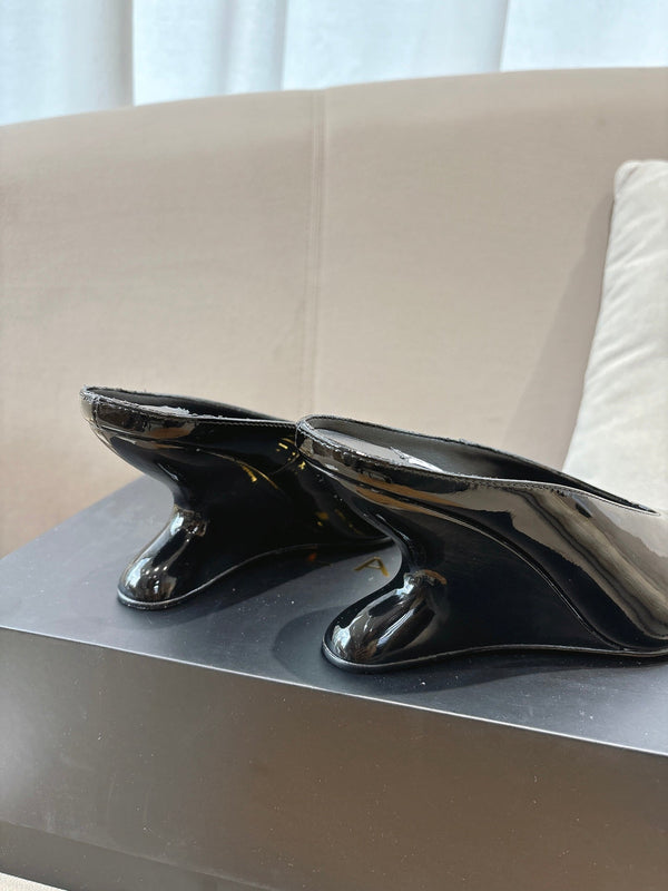 Alaia 25 Curve Wedge Mules Black Lambskin 293555