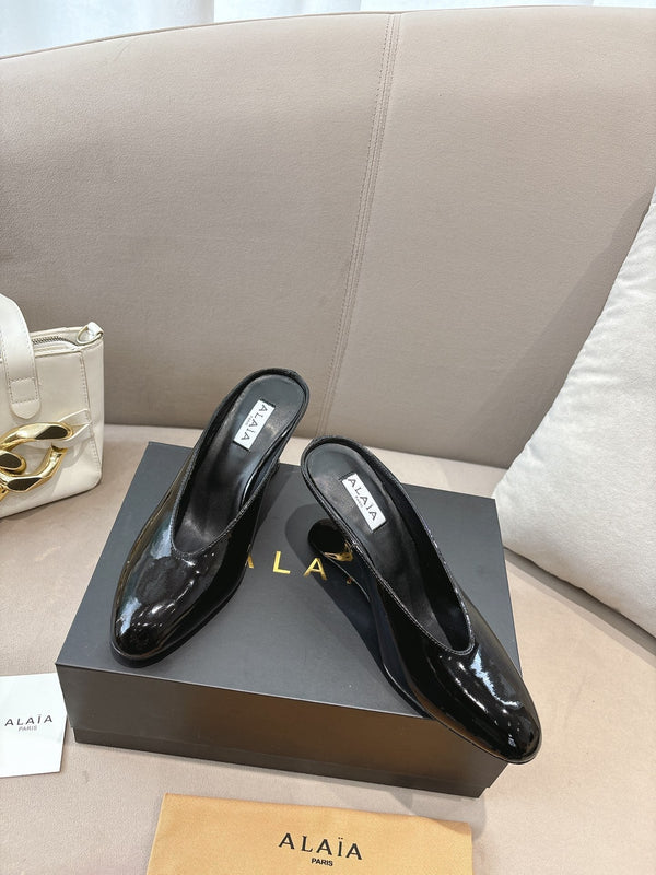 Alaia 25 Curve Wedge Mules Black Lambskin 293555