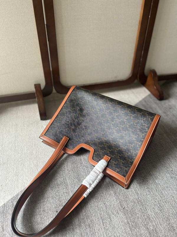 CABAS 37 IN BLACK TRIOMPHE CANVAS AND BRONZE BROWN CALFSKIN TRIM GOLD LOCK