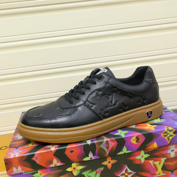 LV TRAINERS IN BLACK CALFSKIN AND BROWN RUBBER