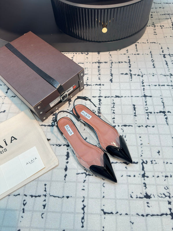 ALAIA FLAT SLINGBACK IN BLACK PATENT CALFSKIN AND FILM