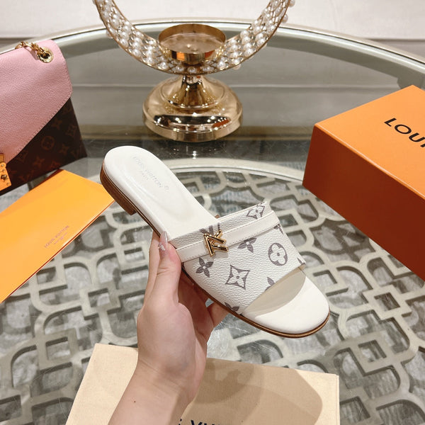 lv sandal isola flat mule cream monogram calfskin