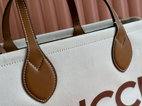 Borsa tote media Gucci in pelle marrone bianca e tela 248187