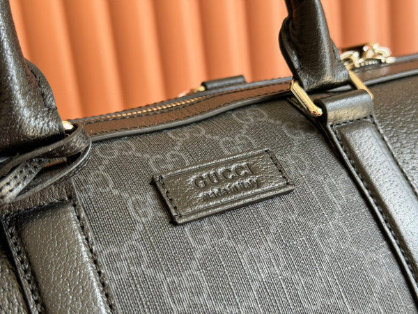 Borsa da viaggio Gucci 44 in tela nera 239956