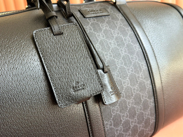 Borsa da viaggio Gucci 44 in tela nera 239956