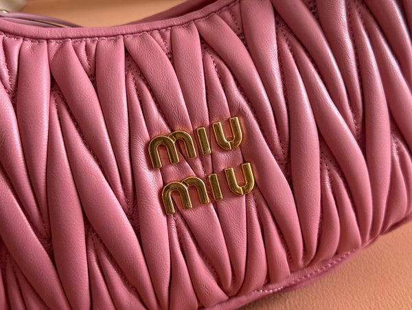 BORSA A MANO TRAPUNTATA WANDER 23 IN PELLE DI AGNELLO ROSA CONTESSA