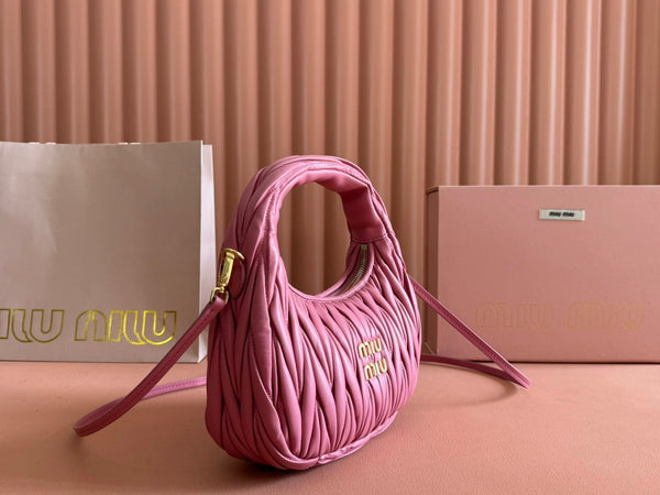 BORSA A MANO TRAPUNTATA WANDER 23 IN PELLE DI AGNELLO ROSA CONTESSA