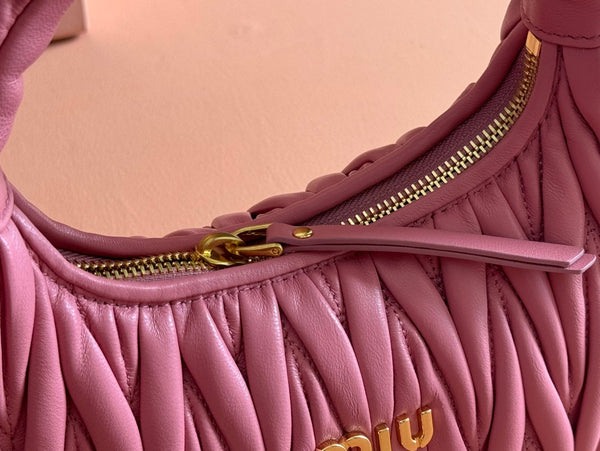 BORSA A MANO TRAPUNTATA WANDER 23 IN PELLE DI AGNELLO ROSA CONTESSA