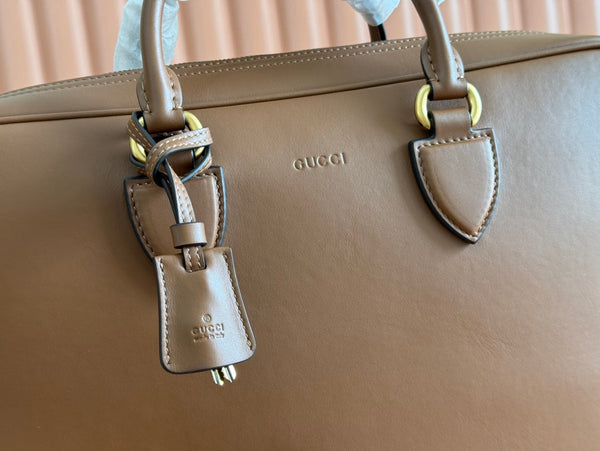 Borsa da lavoro Gucci Emblem in pelle di vitello marrone 248359