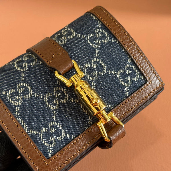 Portafoglio Gucci Jackie in tela e pelle blu marrone 255172