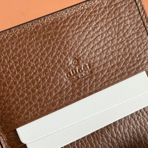 Portafoglio Gucci Jackie in tela e pelle blu marrone 255172