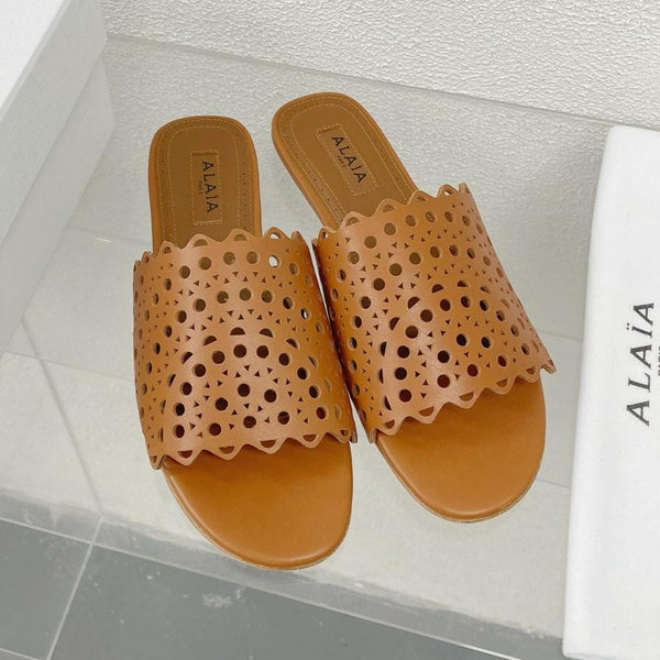 MULES PIATTE ALAIA VIENNE IN PELLE DI AGNELLO MARRONE CIOCCOLATO