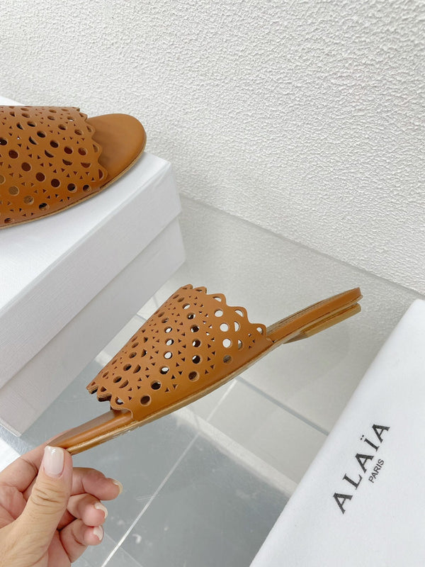 MULES PIATTE ALAIA VIENNE IN PELLE DI AGNELLO MARRONE CIOCCOLATO