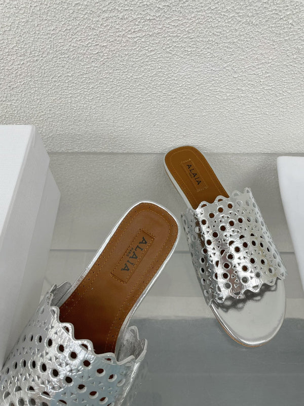 MULES PIATTI ALAIA VIENNE IN AGNELLO ARGENTO