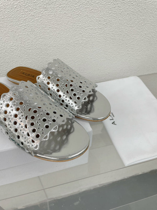 MULES PIATTI ALAIA VIENNE IN AGNELLO ARGENTO