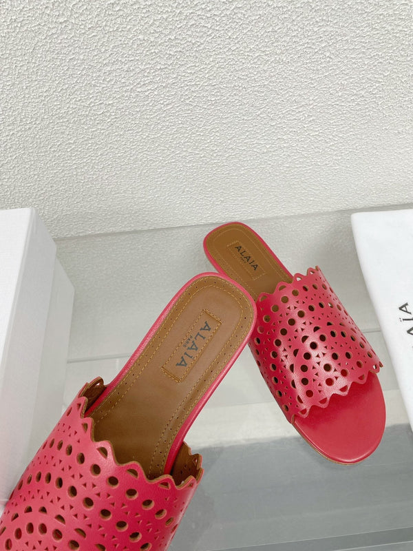 MULES FLAT ALAIA VIENNE IN AGNELLO ROSSO CILIEGIA