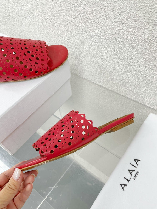 MULES FLAT ALAIA VIENNE IN AGNELLO ROSSO CILIEGIA