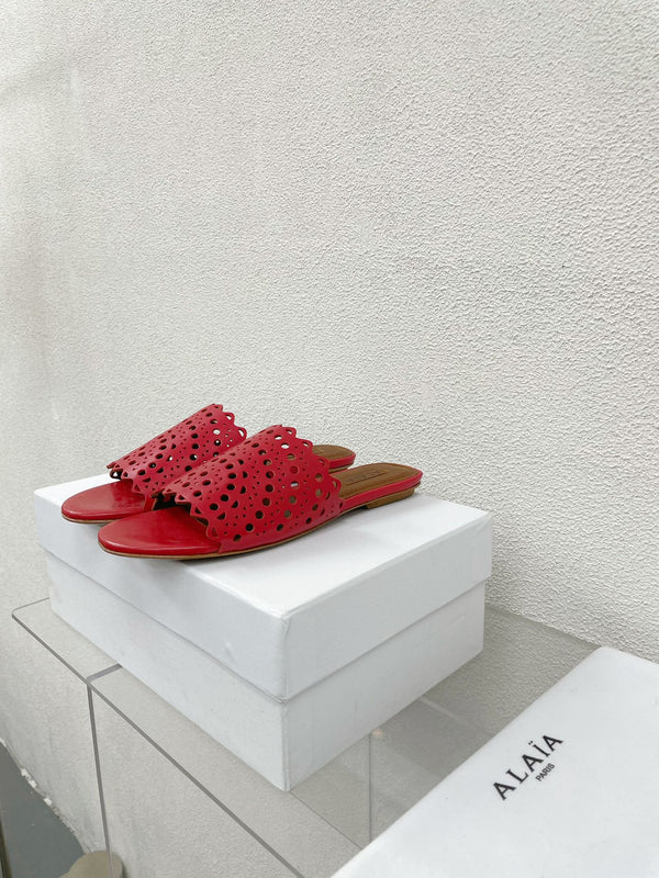 MULES FLAT ALAIA VIENNE IN AGNELLO ROSSO CILIEGIA