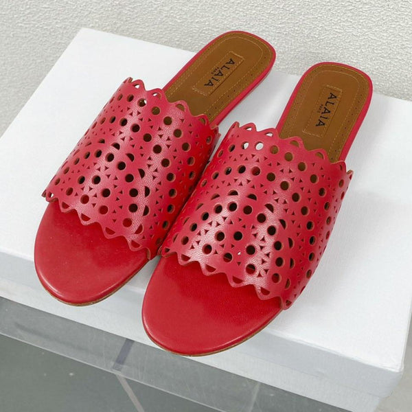 MULES FLAT ALAIA VIENNE IN AGNELLO ROSSO CILIEGIA