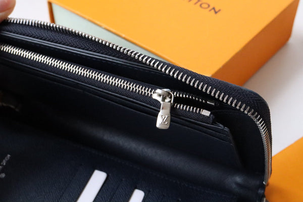 LV Zippy Wallet Vertical Blue Damier Heritage Canvas 217110