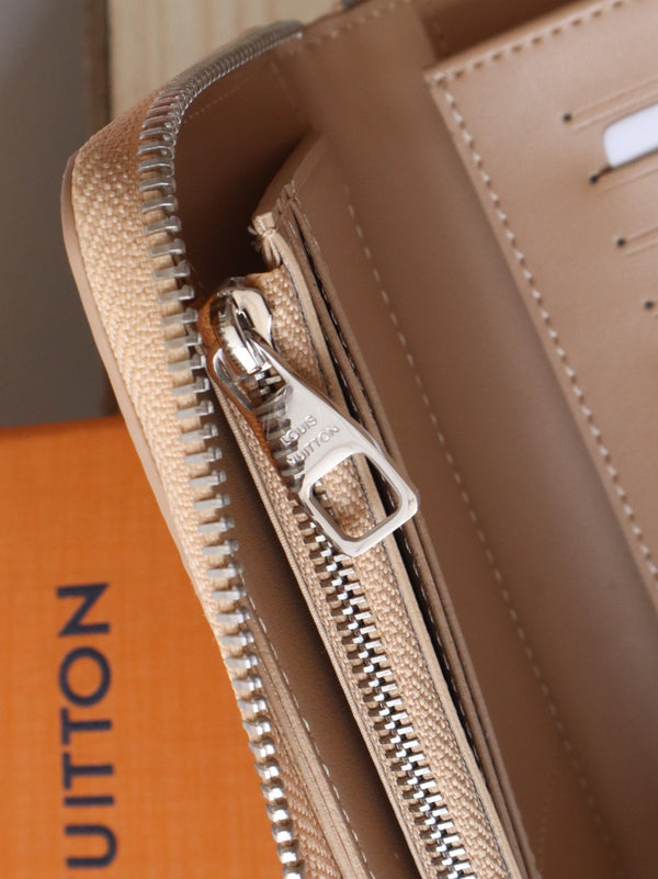 LV Zippy Wallet Vertical Monogram Grained Taurillon Cowhide