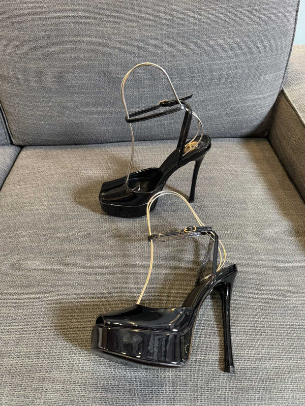 LA SCANDALE PLATFORM SANDALS IN BLACK GLOSSY CALFSKIN