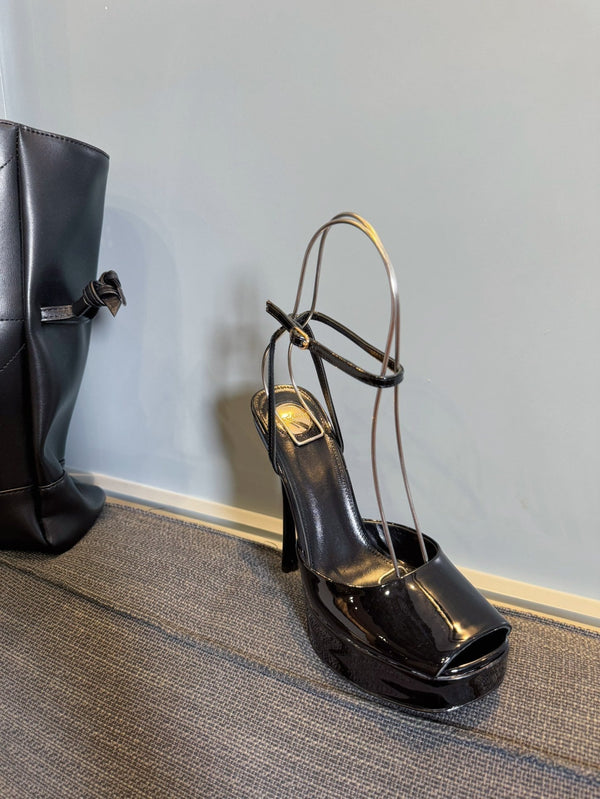 LA SCANDALE PLATFORM SANDALS IN BLACK GLOSSY CALFSKIN