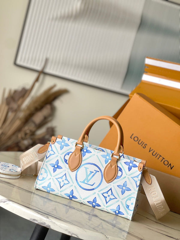 ONTHEGO EAST WEST 25 IN TELA CON PIASTRELLE MONOGRAMMA BLU LAGUNA