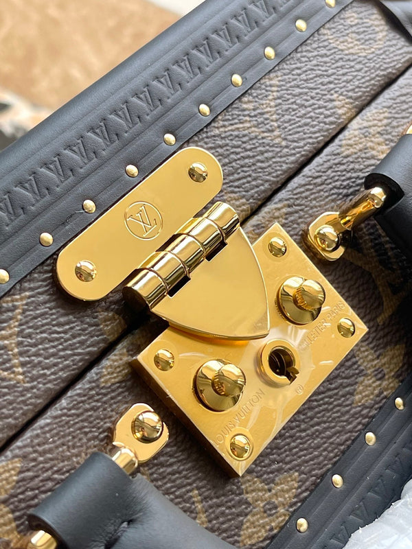 VALIGIA PICCOLA 22 IN TELA RETROMARINA CON MONOGRAMMA E BORDI IN PELLE DI VITELLO NERA, FERRAMENTA ORO