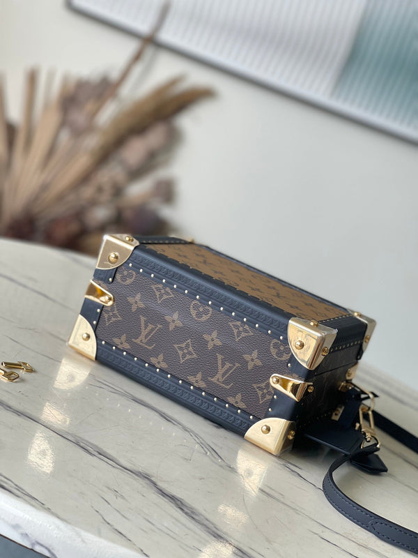 VALIGIA PICCOLA 22 IN TELA RETROMARINA CON MONOGRAMMA E BORDI IN PELLE DI VITELLO NERA, FERRAMENTA ORO