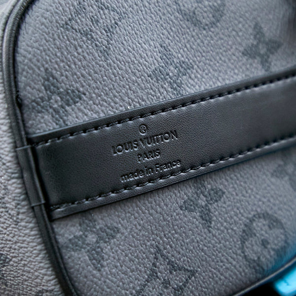 KEEPALL BANDOULIÈRE 25 IN GUN METAL MONOGRAM ECLIPSE CANVAS MIX TURQUOISE CALFSKIN