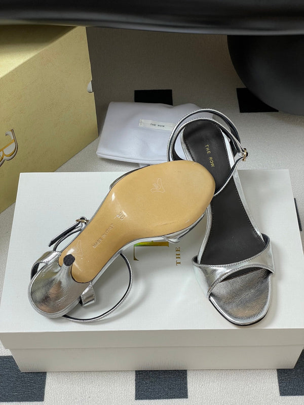 Sandali con tacco alto e cinturino The Row 25S 85 mm in pelle di vacchetta metallizzata nera e oro 286193