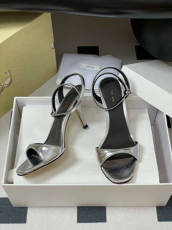 Sandali con tacco alto e cinturino The Row 25S 85 mm in pelle di vacchetta metallizzata nera e oro 286193