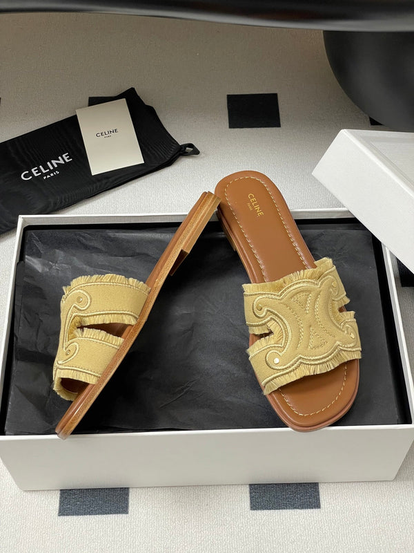 CL Marina Fringed Flat Mule In Caramel Denim 319735