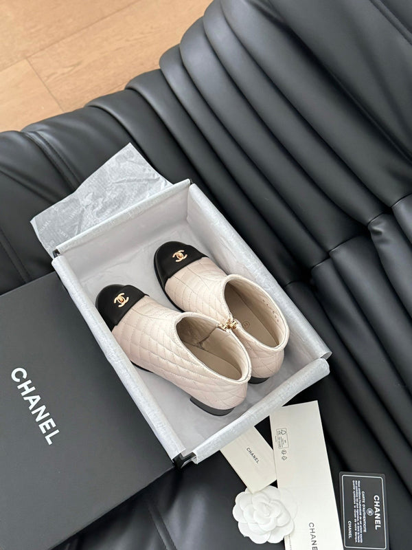 STIVALI CC CORTI 65 MM IN PELLE DI AGNELLO CON MOTIVO TRAPUNTATO BIANCO E NERO