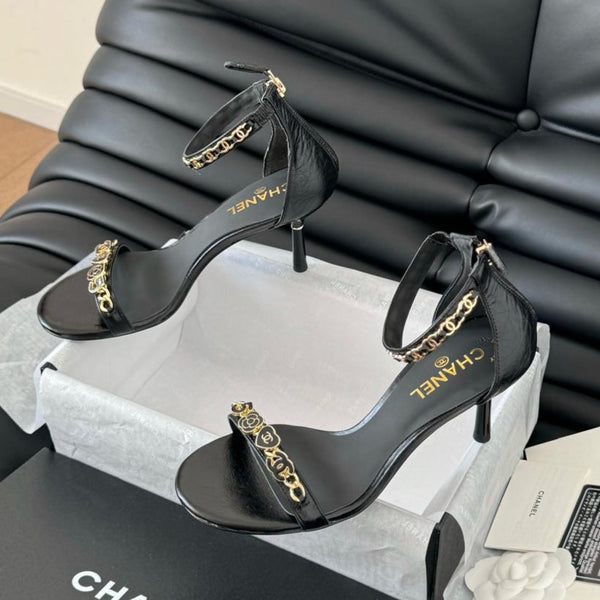 SANDALO TACCO ALTO 7,5 MM IN PELLE DI MONTONE NERA CON ADESIVI