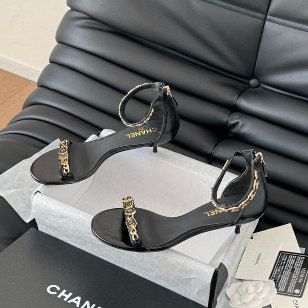 SANDALO TACCO MEDIO 35 MM IN PELLE DI MONTONE NERA CON ADESIVI