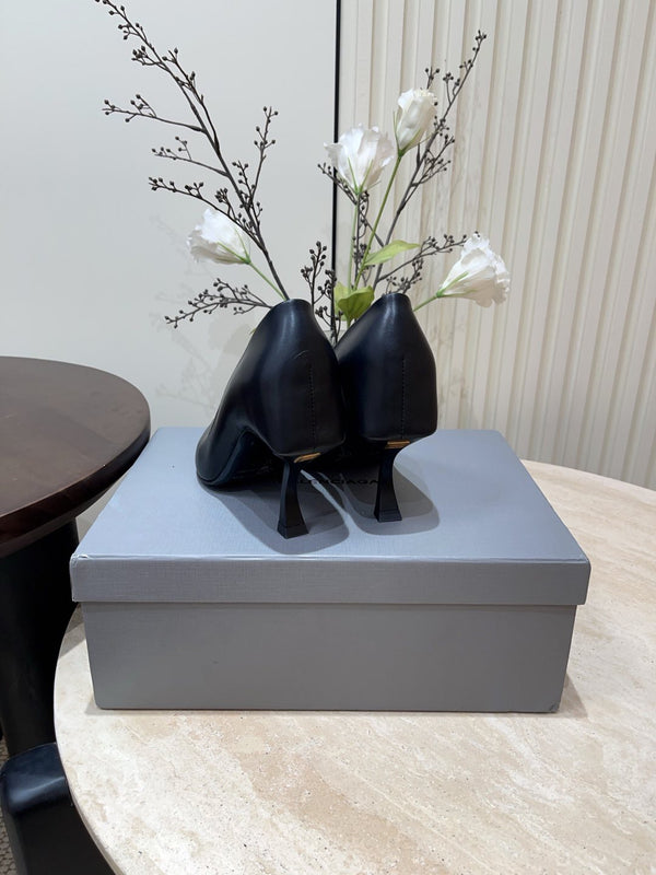 DÉCOLLETÉ CON TACCO CURVO E BOCCA BASSA IN PELLE DI VITELLO NERA