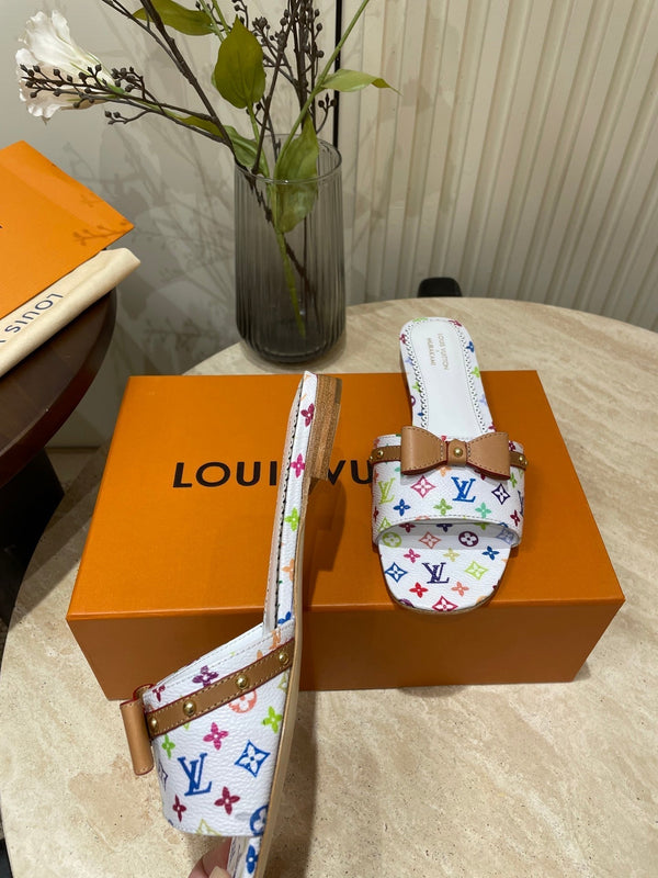 FLAT MULES IN WHITE MONOGRAM LAMBSKIN